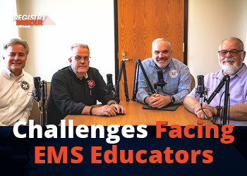 Four individuals seated at a table with microphones, discussing challenges facing EMS educators.